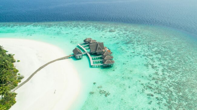 Photo Credit: ishan seefromthesky via Unsplash A Record High in February, New Maldivian Tourism Milestone. An aerial of a section at Kihavah Huravalhi Island Baa Atoll, Maldives. Photo Credit: ishan seefromthesky via Unsplash